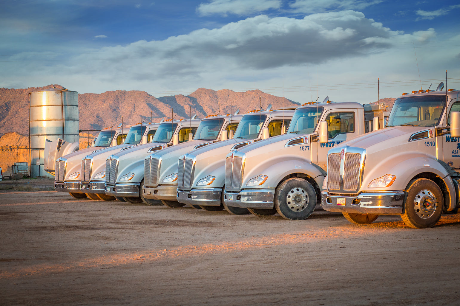 Trucks parked in a row out side Office